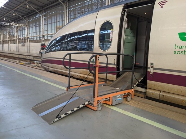 The ramp for getting on and off the train. You roll on to the central section. The ramp then rises until it’s level with the train and then you roll straight on.