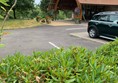 Picture of the car park and a building at Roucan Loch Crematorium