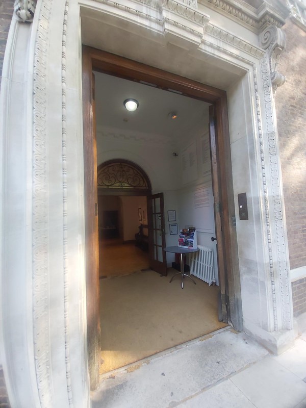 Stone arched doorway with level entrance