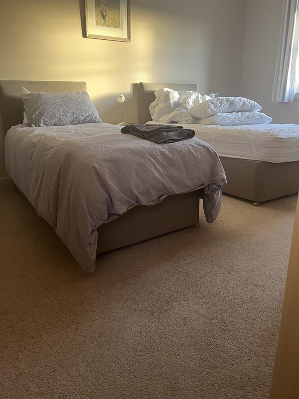 Image of twin beds in a room