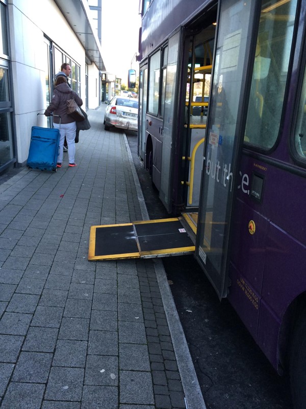 Bus with wheelchair ramp.