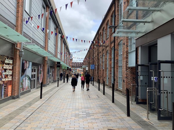 Picture of an alley between shops