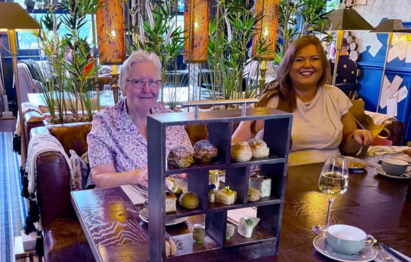 Image of two women sitting at a table