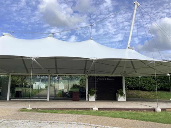 Image of a tent in a filed