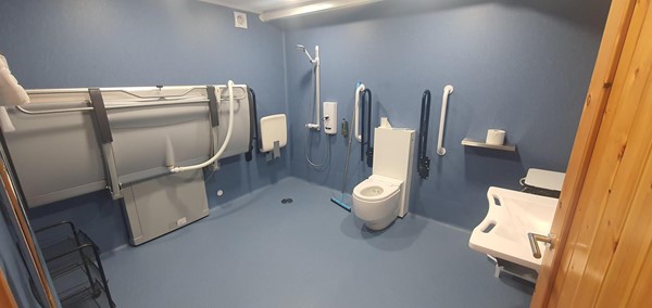 Image of the shower and toilet in the accessible glamping pod.