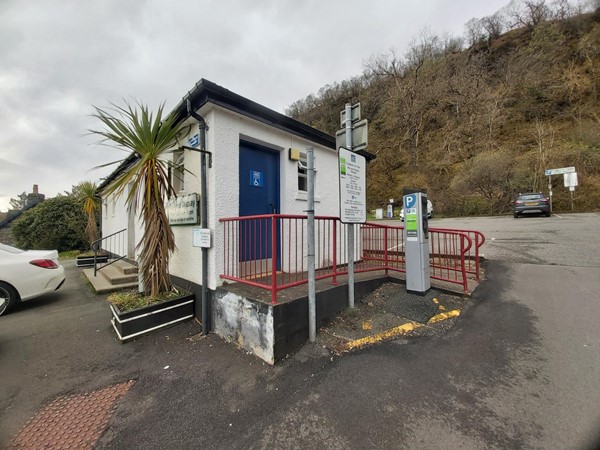 Image of the ramped entrance leading up to the accessible toilet building.