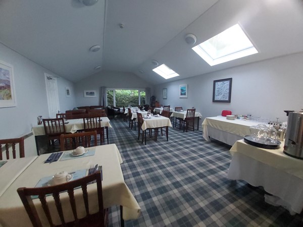 Image of a room with tables and chairs