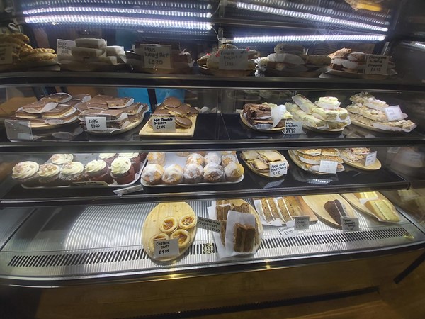 Image of a display case with pastries on it