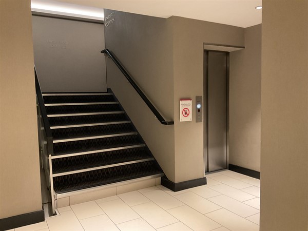 Image of stairs and a lift