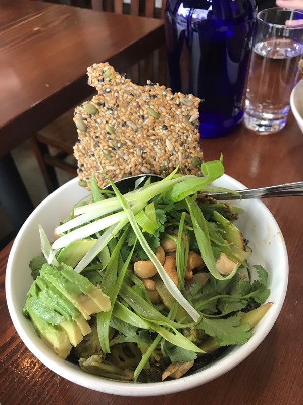 Green Bowl 
 Dark greens, bok choy, broccoli, zucchini, onions in coconut green tie curry on  brown rice with avocado, toasted cashews,, cilantro and scallions $16