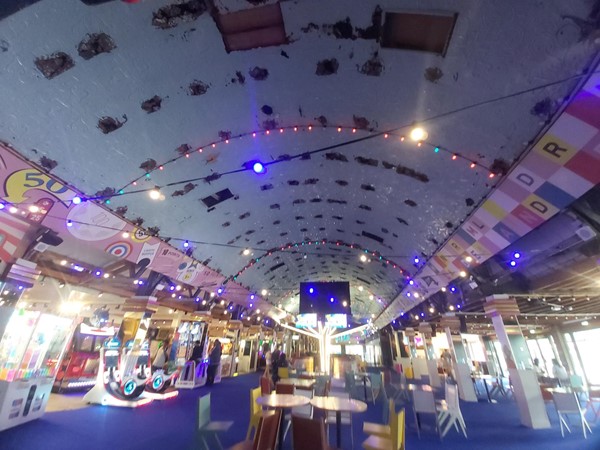 Image of a room with lights and tables