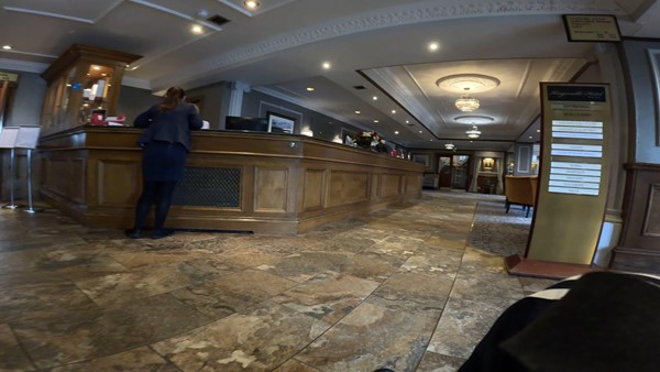 The check in desk within the hotel.