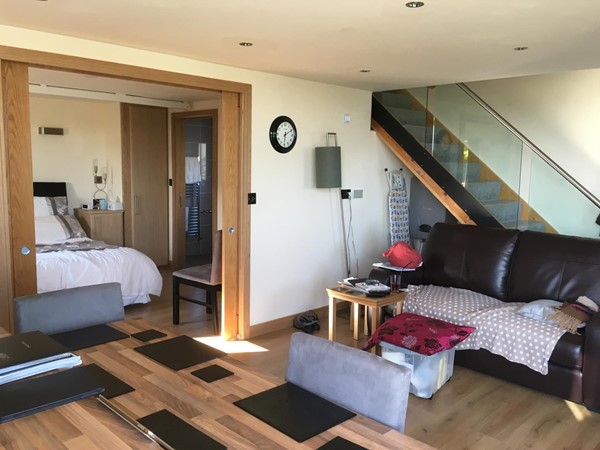 Open plan lounge kitchen and dining area with easy access to ensuite wetroom