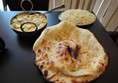 vegetable korma, pilau rice and garlic naan bread