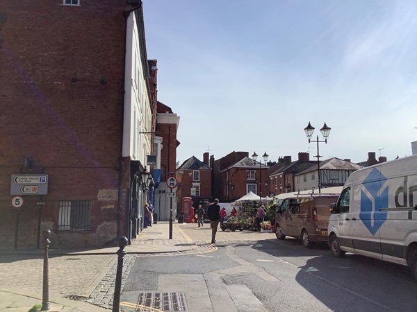 Picture of a street with a DPD van in it