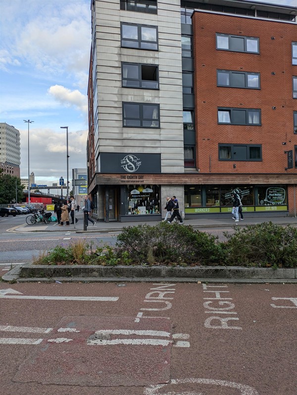 Image of the entrance to The Eighth Day Shop & Cafe