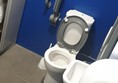 Picture of disabled toilet being used as a store cupboard