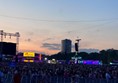 View over the crowd/BST area as sun set.