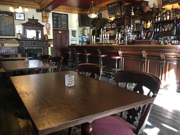 Photo of interior of pub.