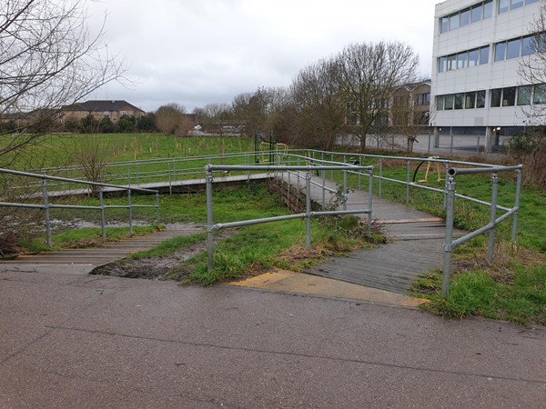 The wooden ramp used to access the south west side of the site from Riverside Bridge