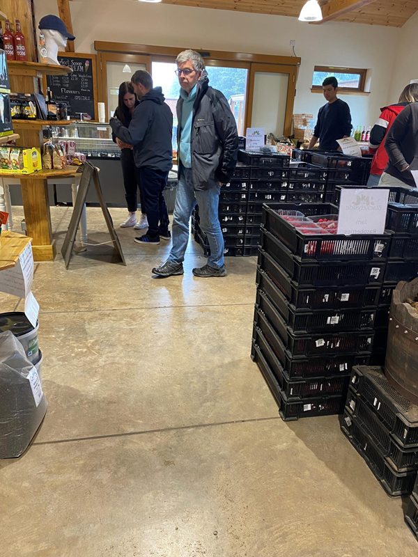 a picture of the fresh and frozen produce section after you enter the shop at the main entrance to show the level access