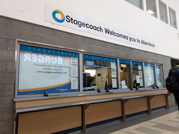 Image of the ticket desk, above which is the wording "Stagecoach Welcomes You to Aberdeen"