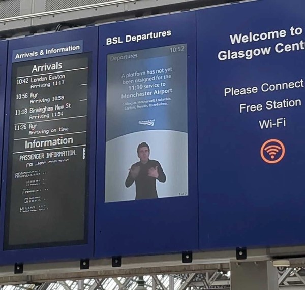 A sign with information and text and BSL