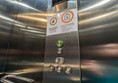 Image of lift access. The lift buttons have Braille Markings