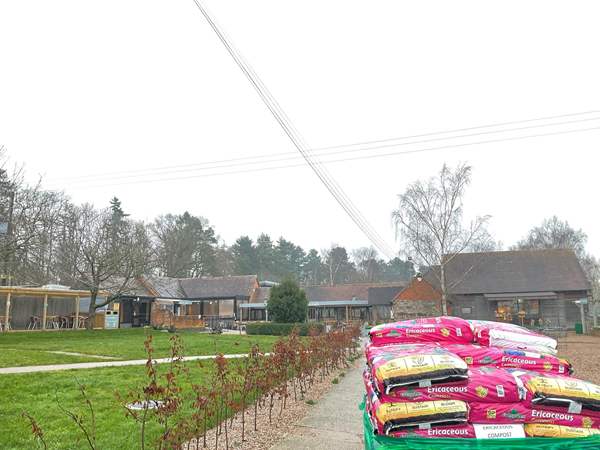 A small garden supply area, and a coffee shop