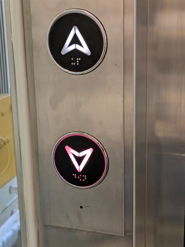 Image of a close up of lift buttons