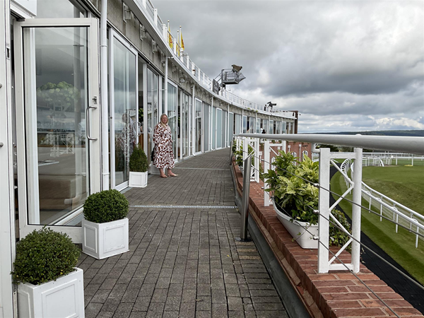 Image of a balcony overlooking a racecourse