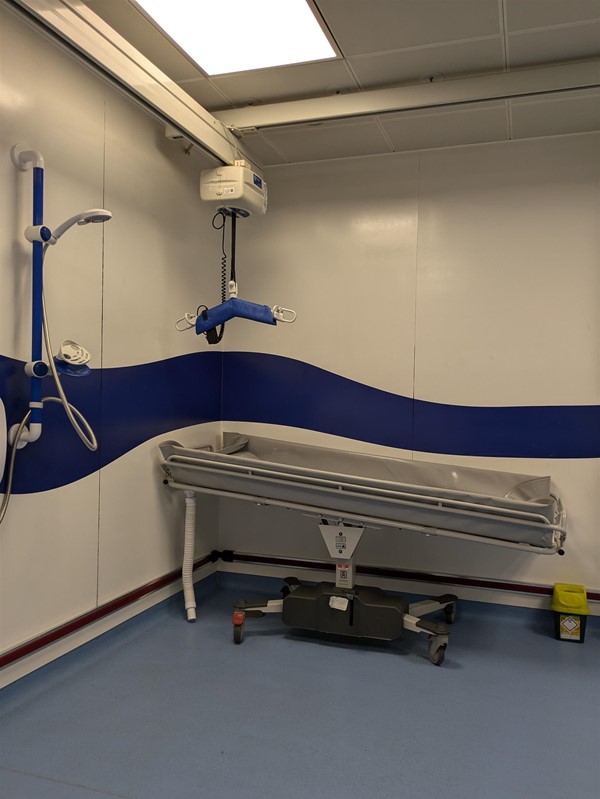 Image of Ceiling Track hoist and Adjustable change bed in the Changing Places toilet