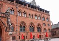 Front of Mount Stuart house with seating and level access.