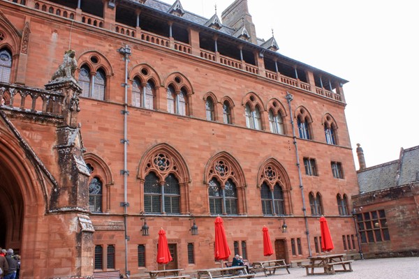 Front of Mount Stuart house with seating and level access.