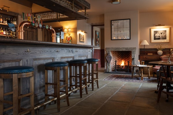 Bar area with a welcoming fire