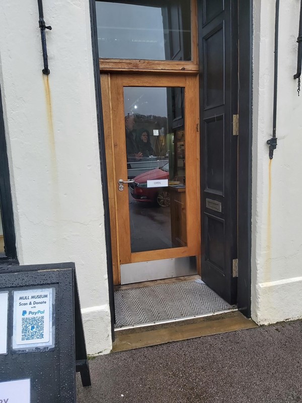 Image of a door with a glass panel