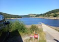 Getting to the boat. Normally the water is higher so less slope. . Don’t let the slope but you off. There are plenty of willing helpers going up and down here all day!