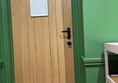 Image of door with a white board on it