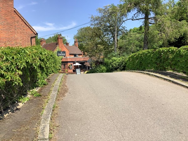 Pleasant cottages  to take you along to the canal bridg