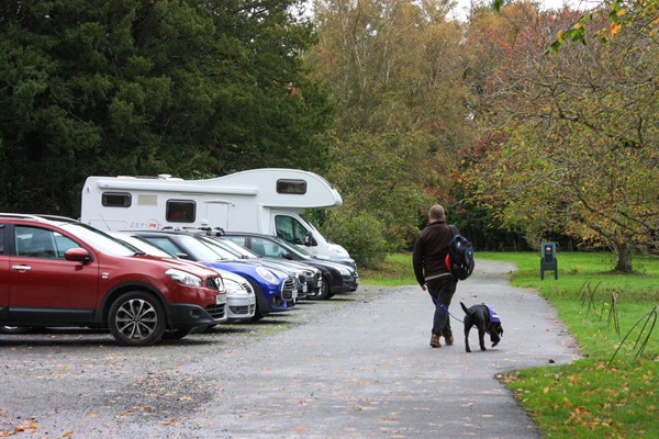 Disabled parking area with 5 or 6 cars plus motorhome.