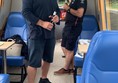 Picture of people standing inside a narrow boat