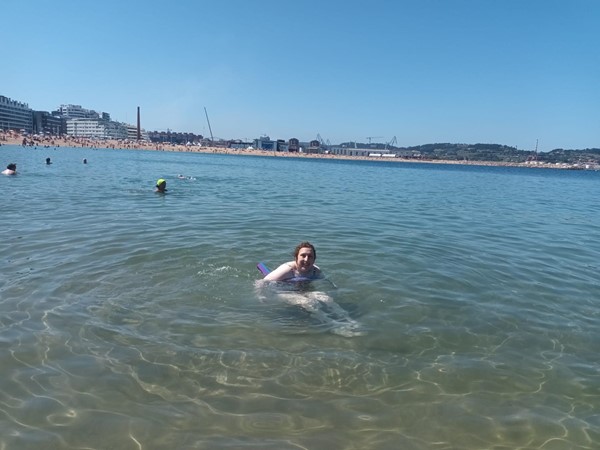 Made it into the water at Poniente beach, Gijon, thanks to the amphibious wheelchair service and the noodle float they lent me