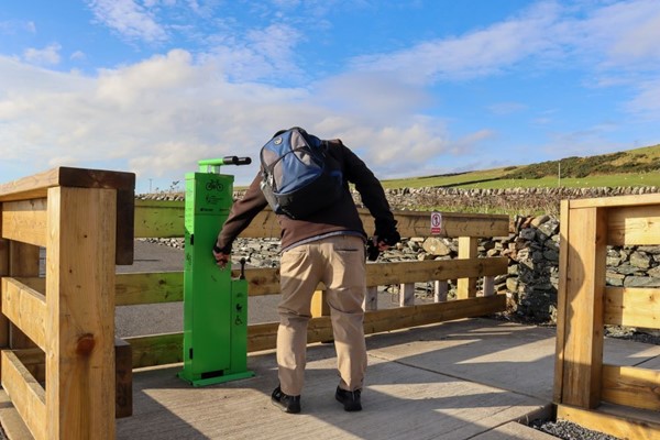 Service point with various tools, tyre pump and other handy gadgets for bikes and wheelchairs.