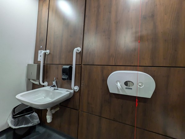 Image of the sink in the accessible toilet.