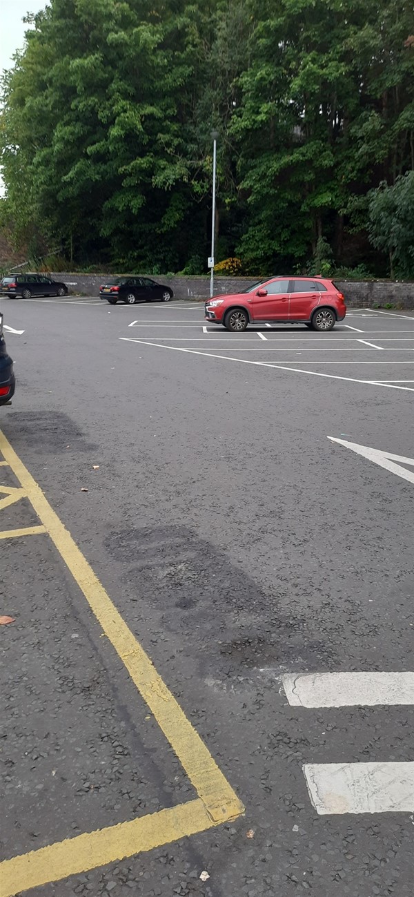 Image of a car in a car park