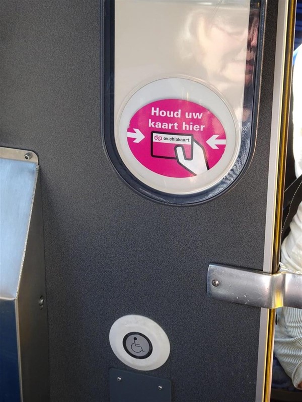 Close up of one of the buttons on which you touch your chipkaart after boarding a tram and just before you leave the tram.