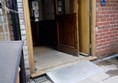 Picture of a wide door with a ramp