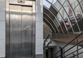 Image of lift entrance to St Enoch Subway Station and stairs with grab rails on both sides