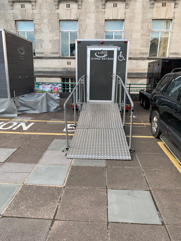 Ramped entrance to an accessible toilet on-site.