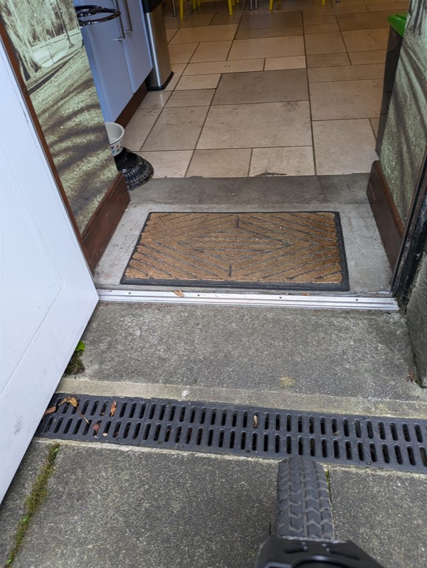 Image of doorway to the accessible toilet of Andrew Carnegie Birth Museum